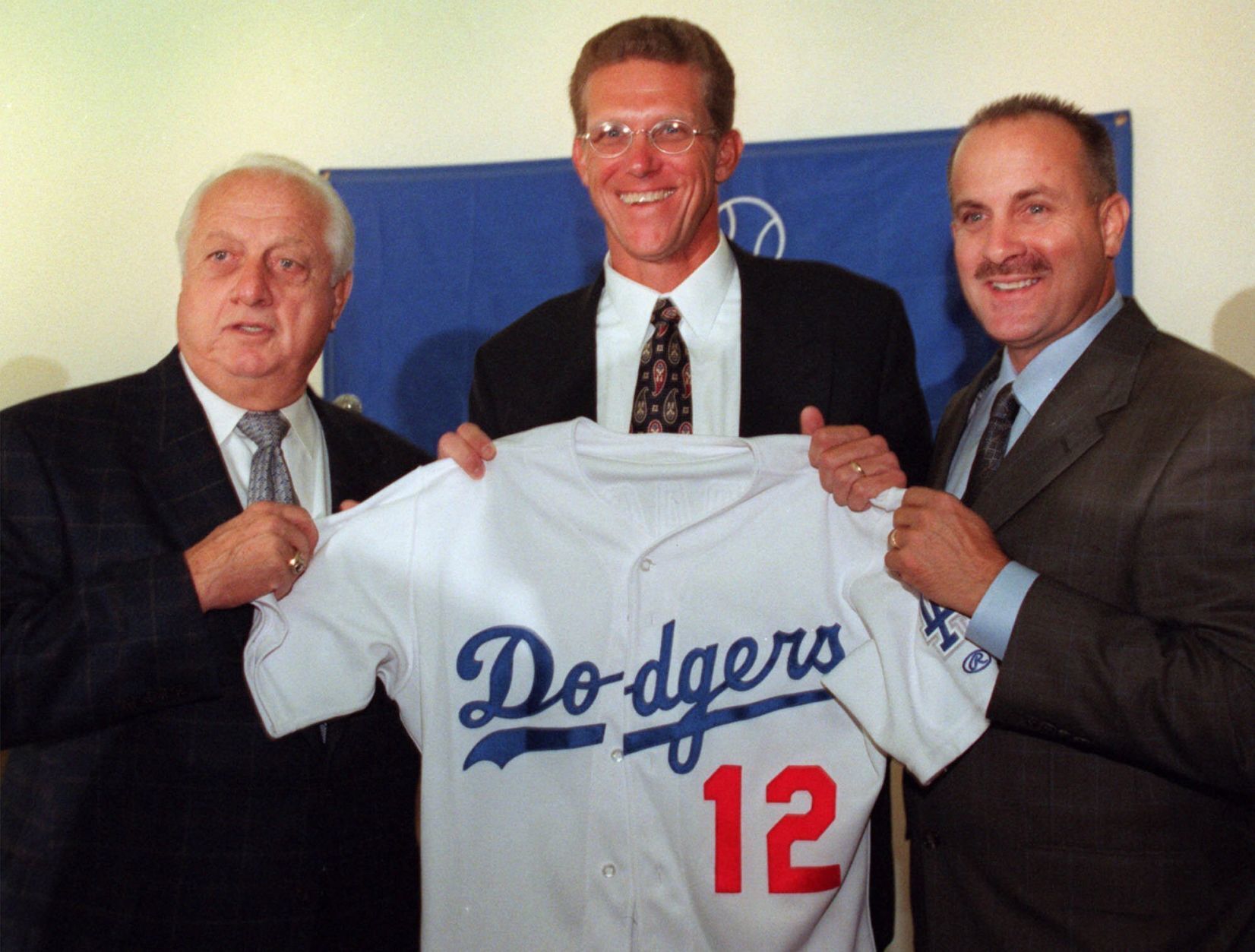 Jim Tracy signs on